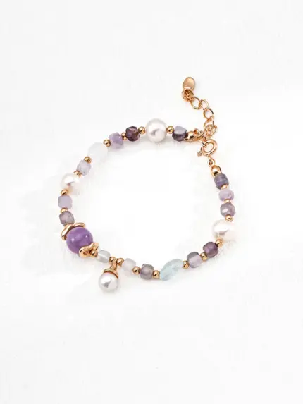 Glimara bracelet with natural pearls, amethyst, and aquamarine stones