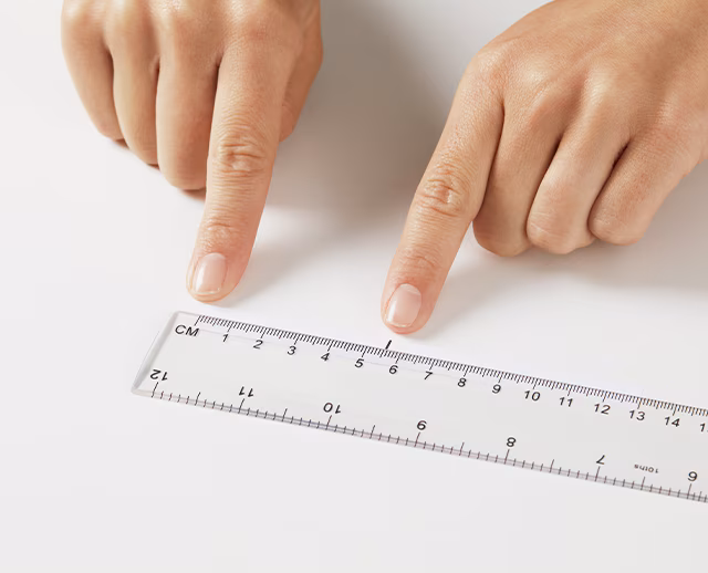 Measure the length of paper to the point you have marked.