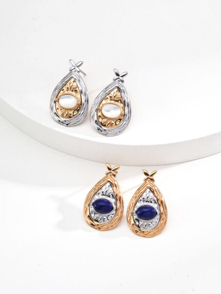 Teardrop lapis lazuli earrings in sterling silver with floral details and gemstones