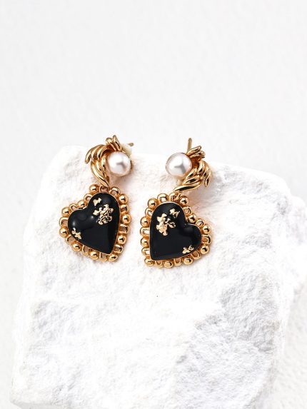 Heart-shaped black agate earrings with natural pearls and gold details